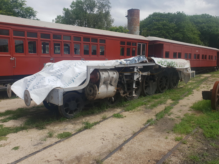 Frames & chassis of C17 No.253 stored under a tarpaulin. 18 December 2020.